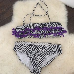 Zebra print swim suit with purple (NEVER WORN)